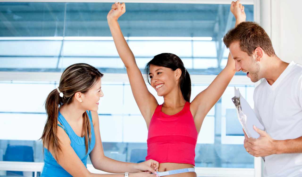 woman celebrating weight loss