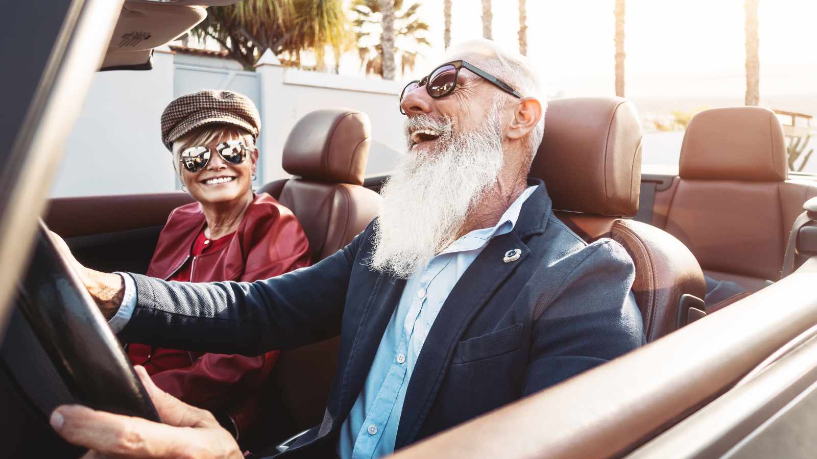 Old man driving a car