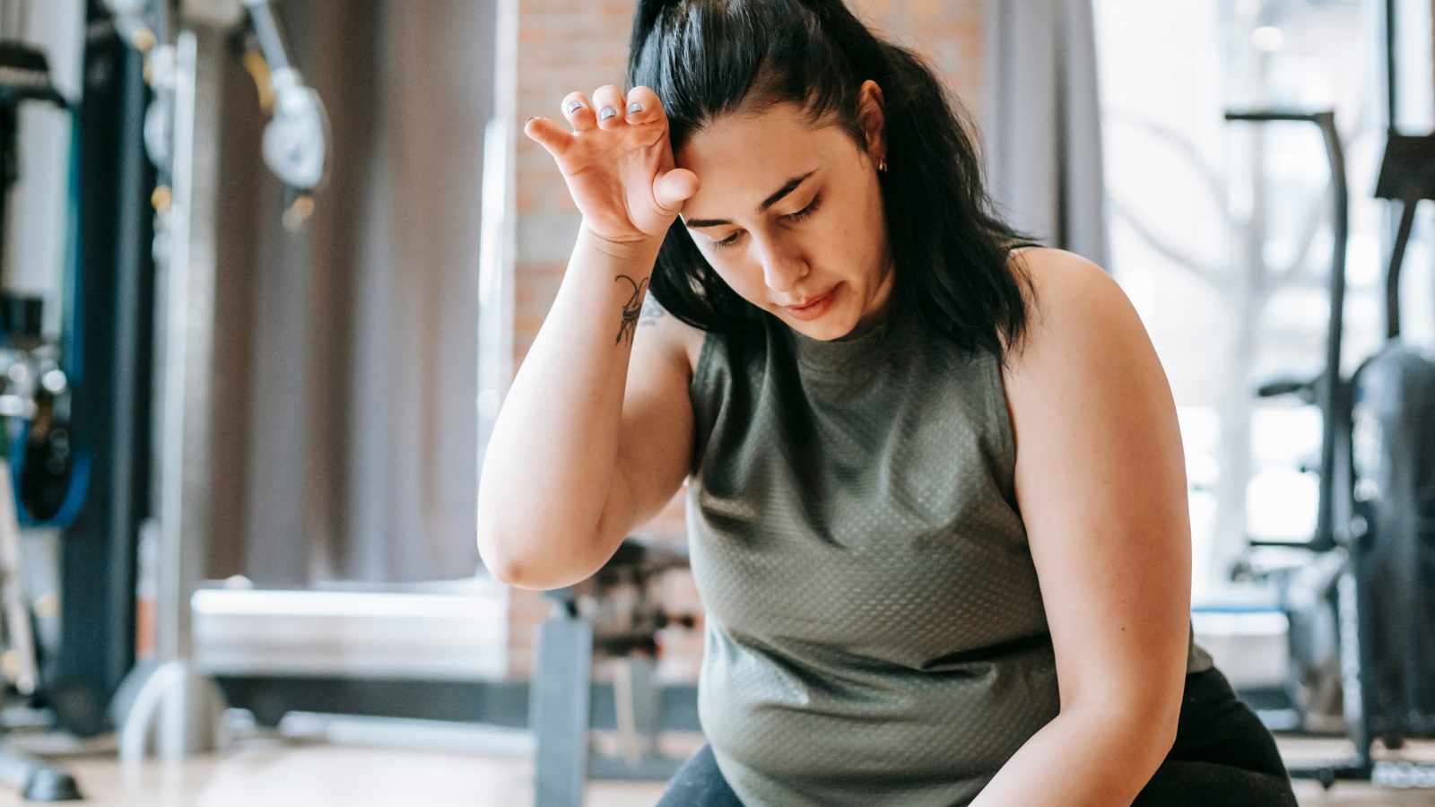 Sad lady at the gym