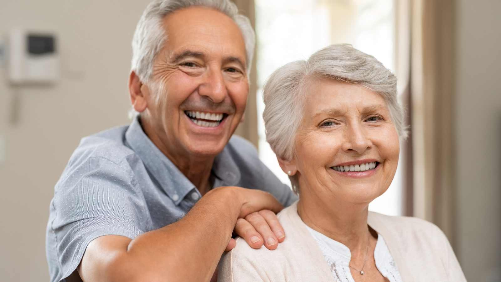 happy senior couple smiling