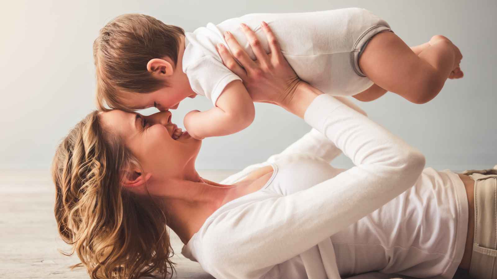 lady playing with baby