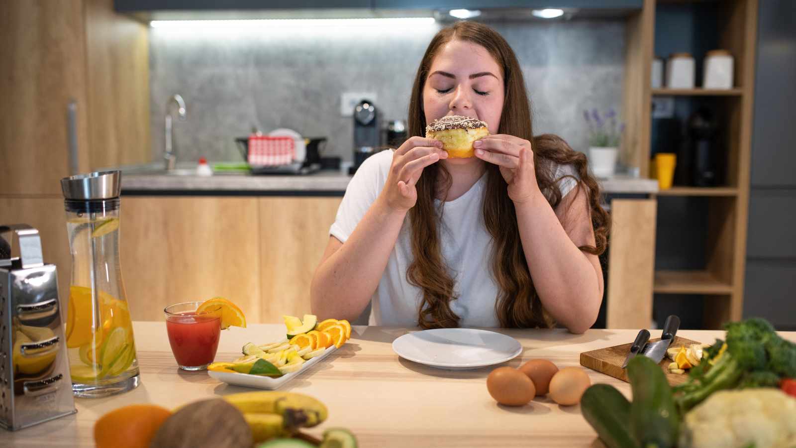 Lady eating on cheat day