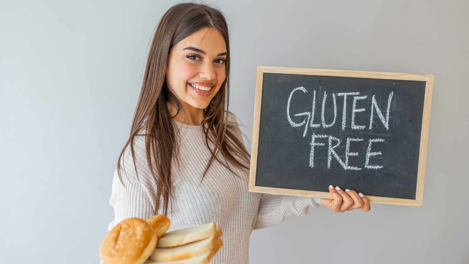 Lady holding gluten free board