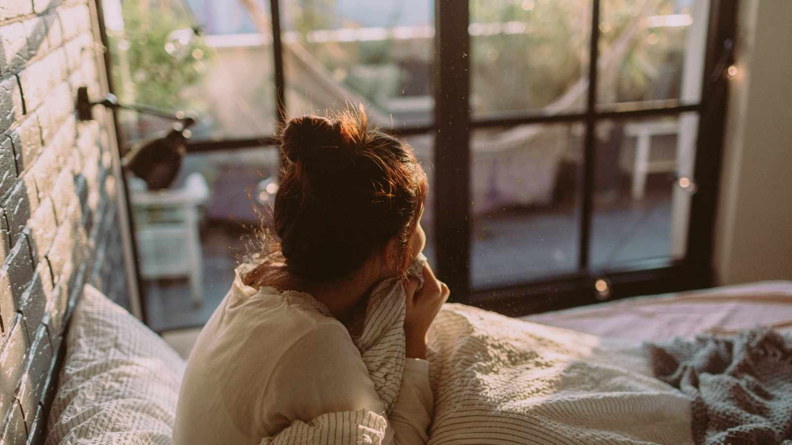 Lady in bed in the morning