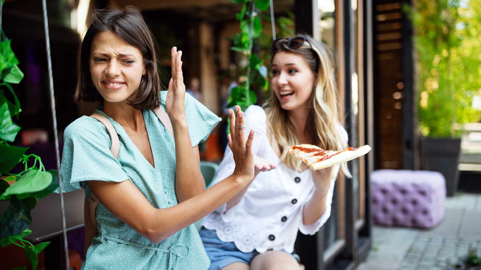 Lady rejecting pizza