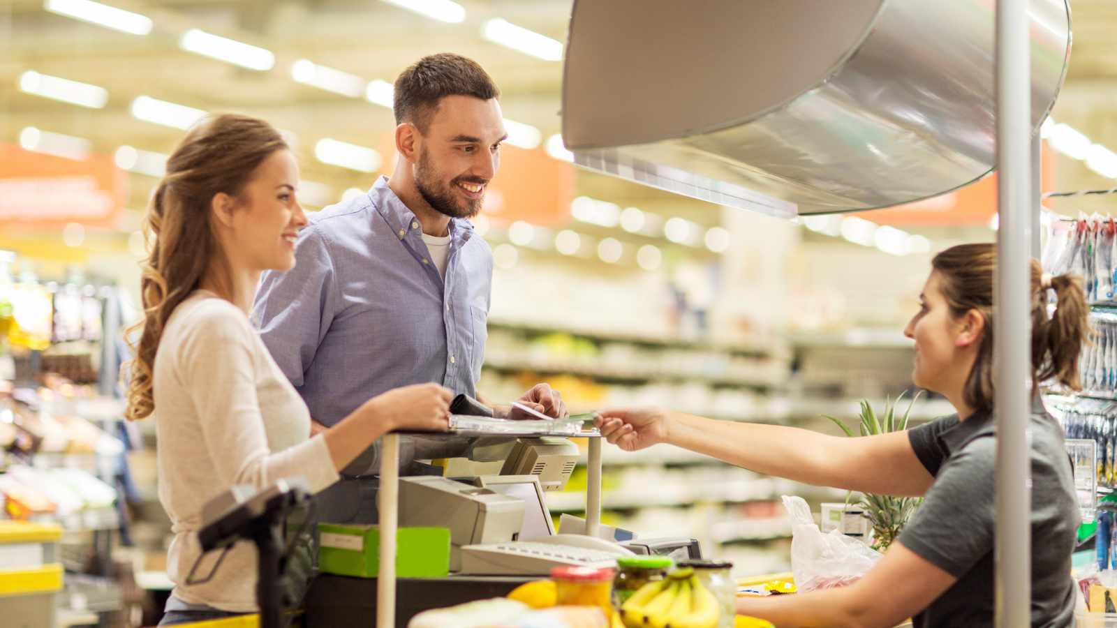 customers paying a cashier