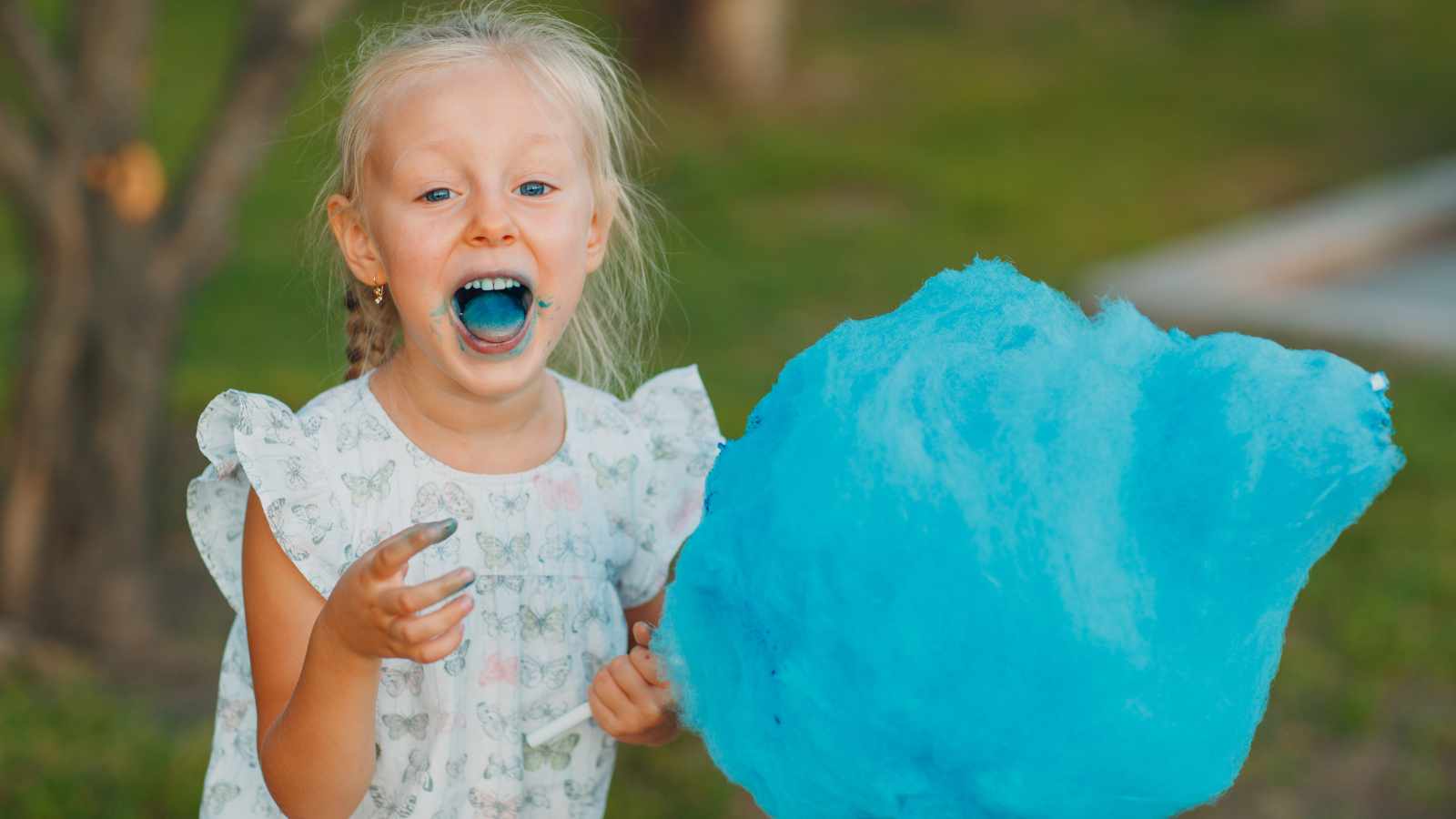 Girl holding cotton candy