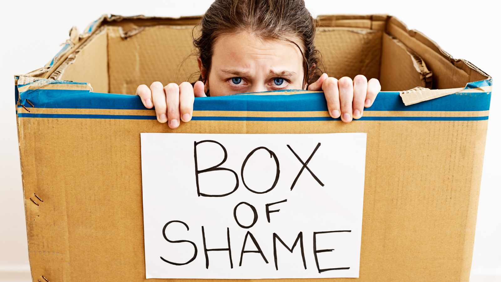 Lady in a box of shame