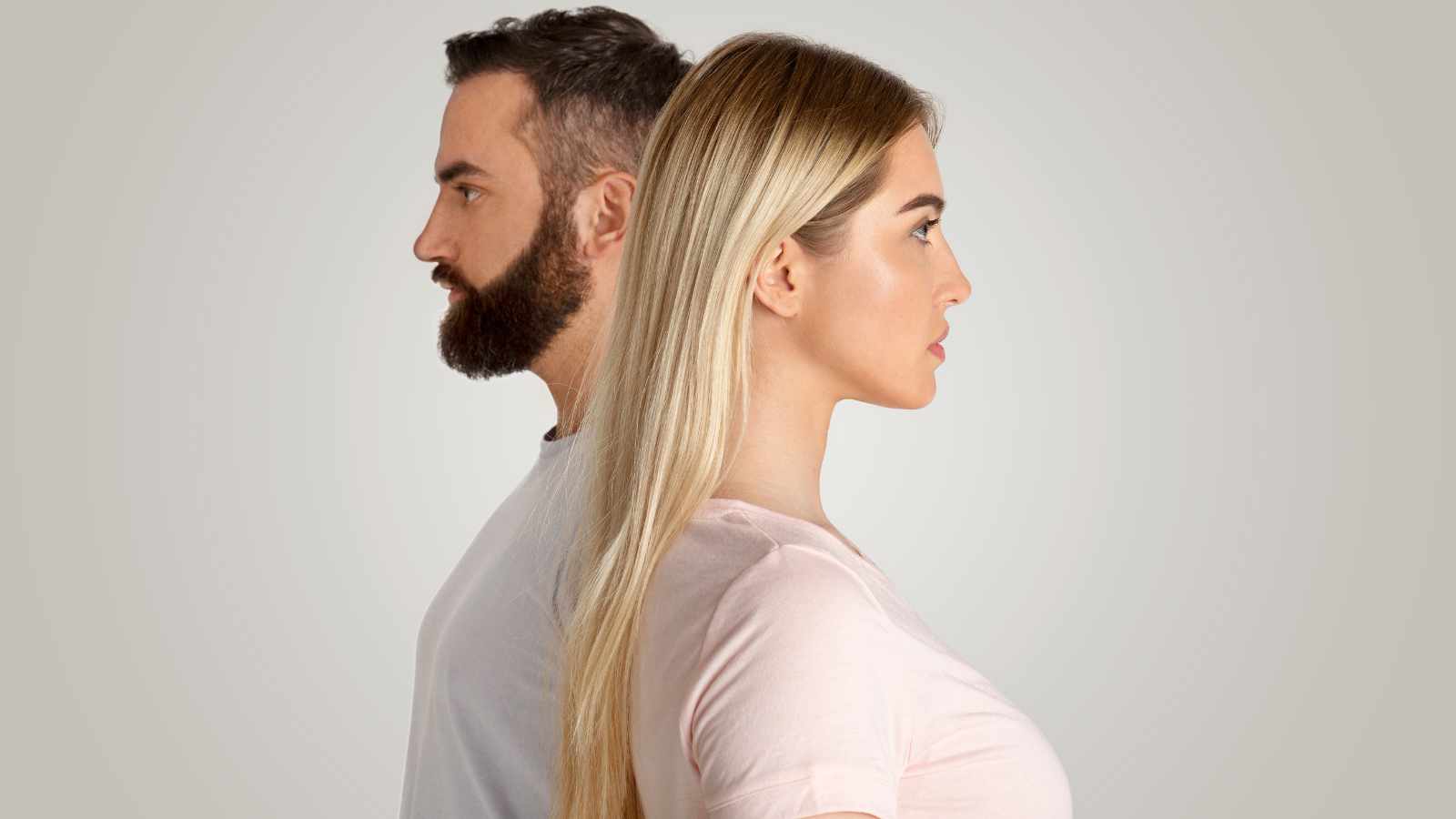 man and woman backing each other