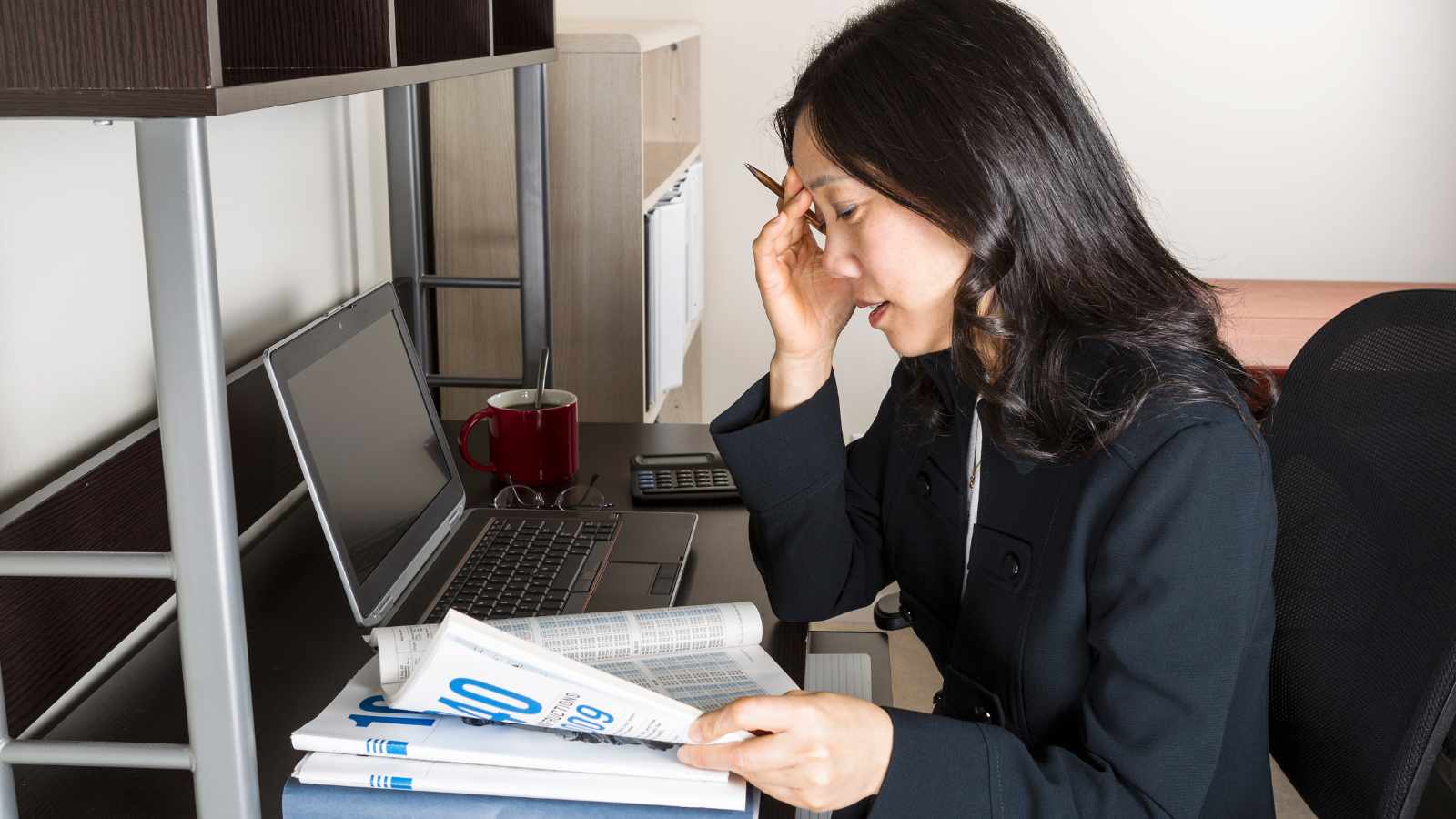 woman thinking at work