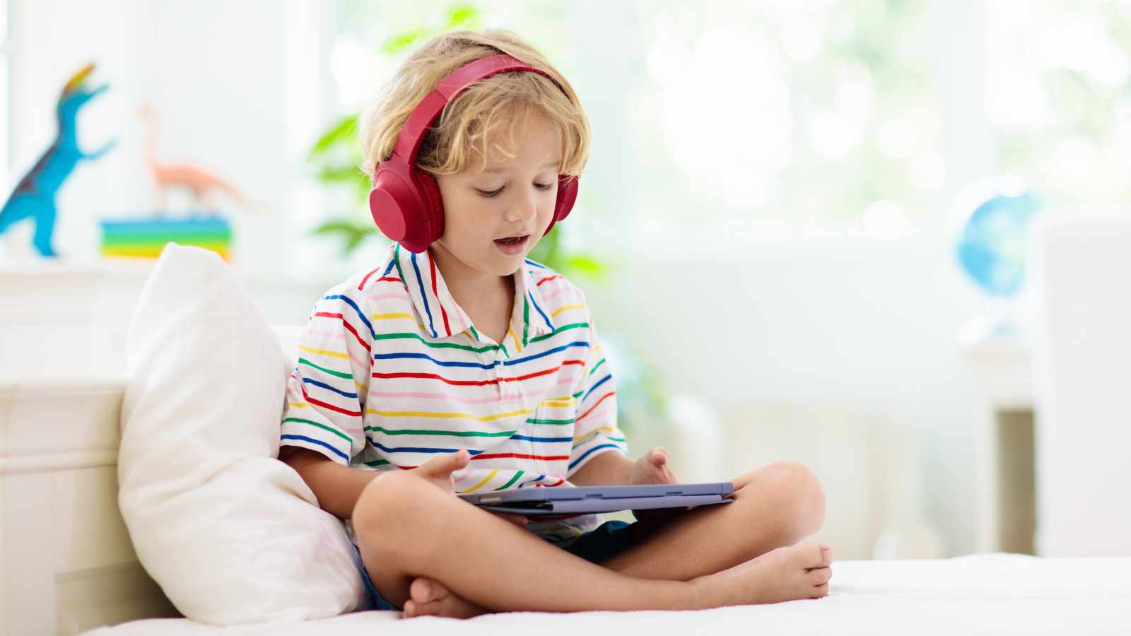 Child playing with a tab