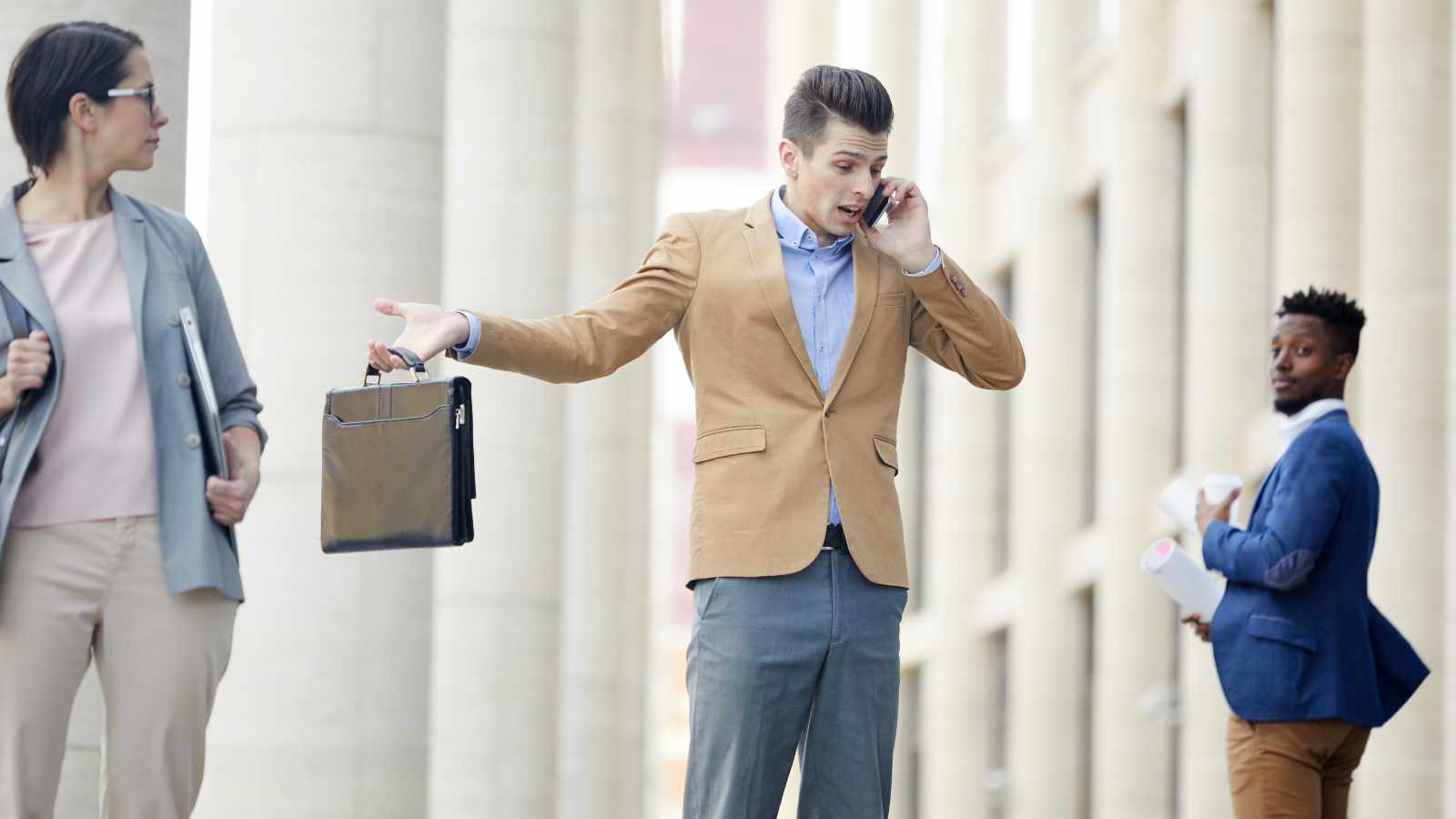Man talking too loudly on phone
