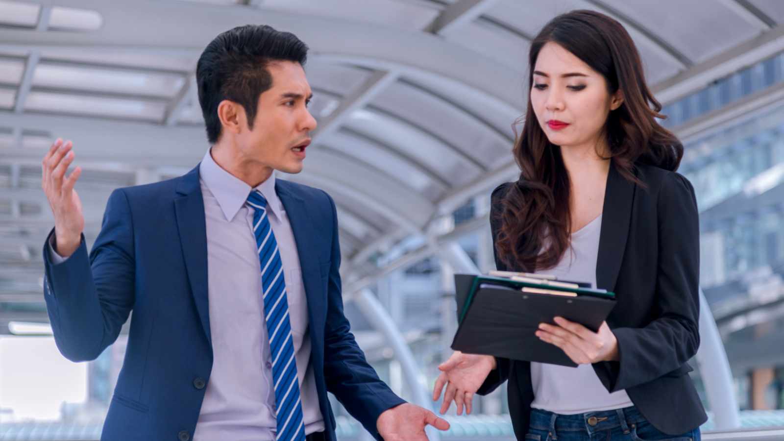 man and woman discussing