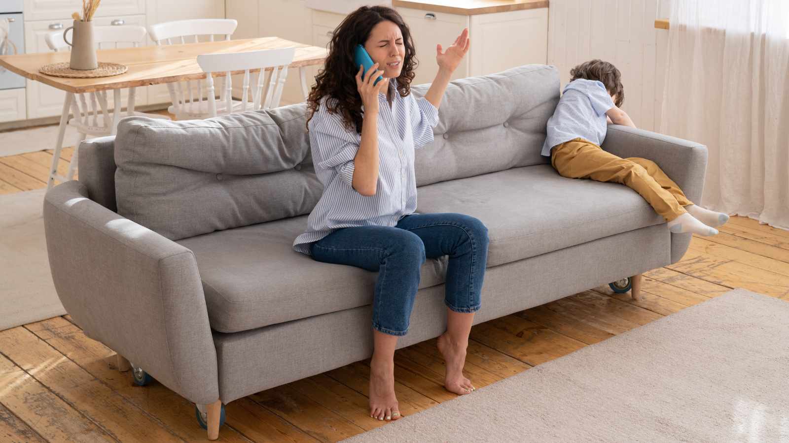 sad woman on the phone little boy crying