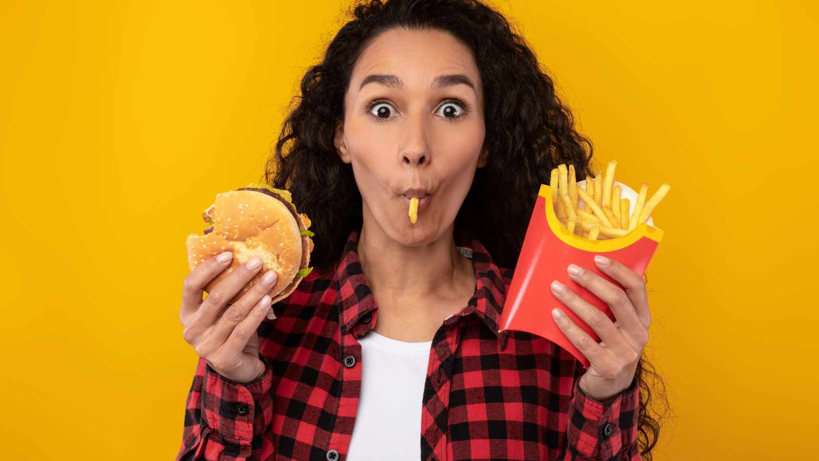 Lady eating french fries