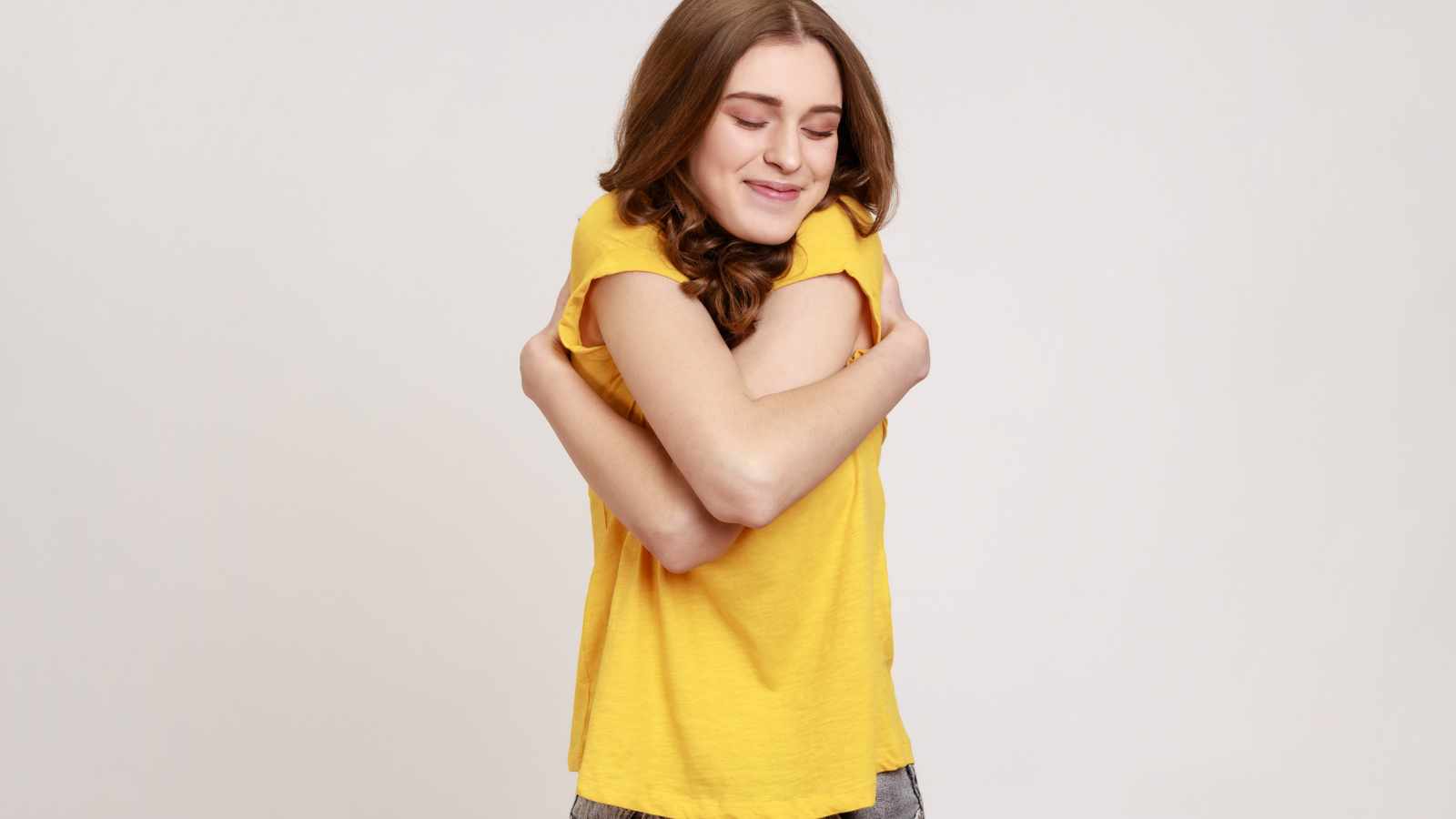 Lady hugging herself