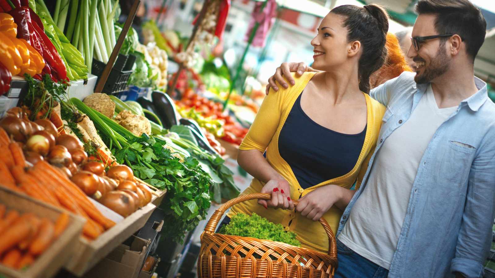 young couple shopping around the market