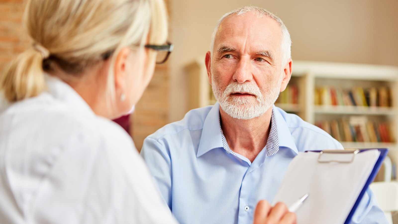 Senor patient paying attention to Doctors