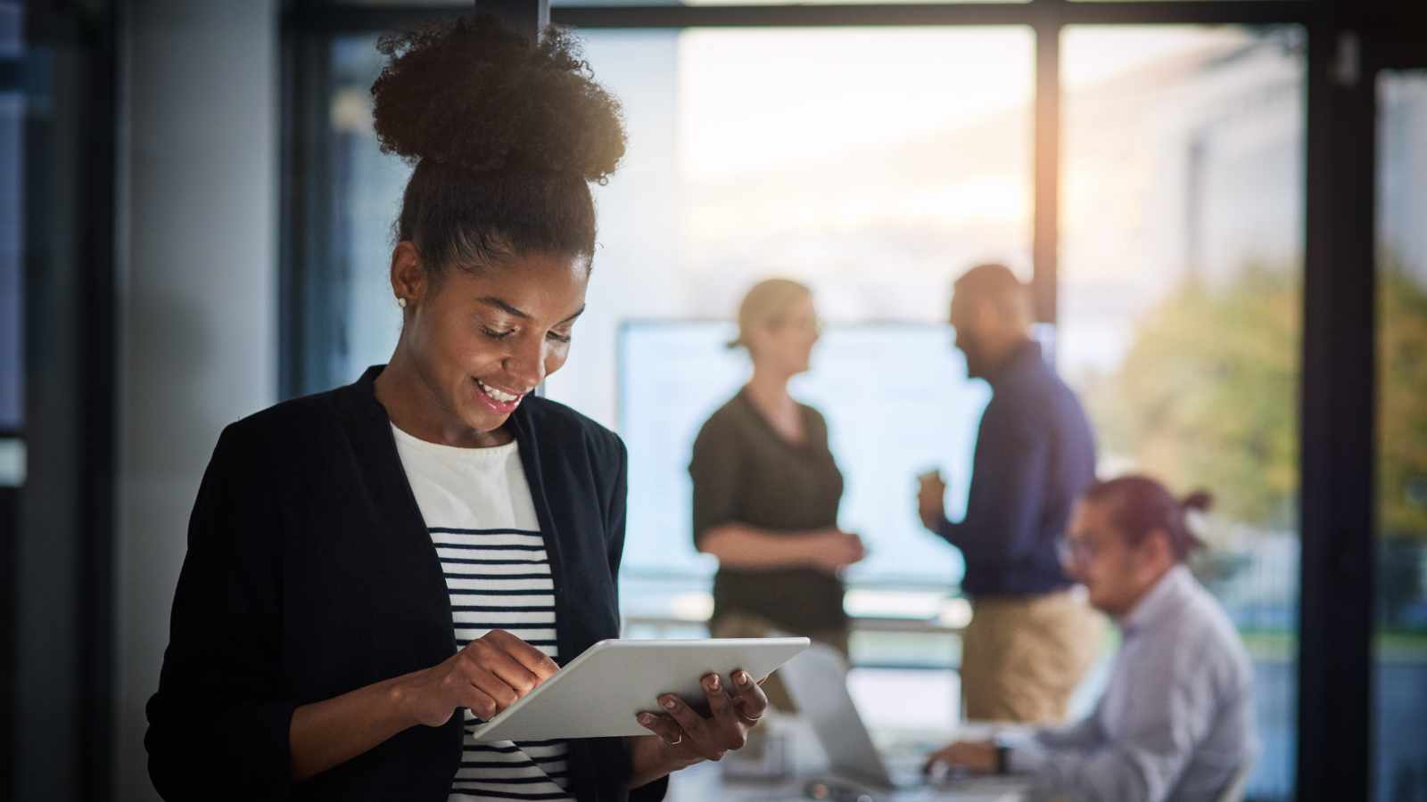 lady using a tab at work